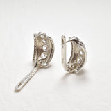 Created Diamonds set in a Solid 925 Sterling Silver huggie earrings