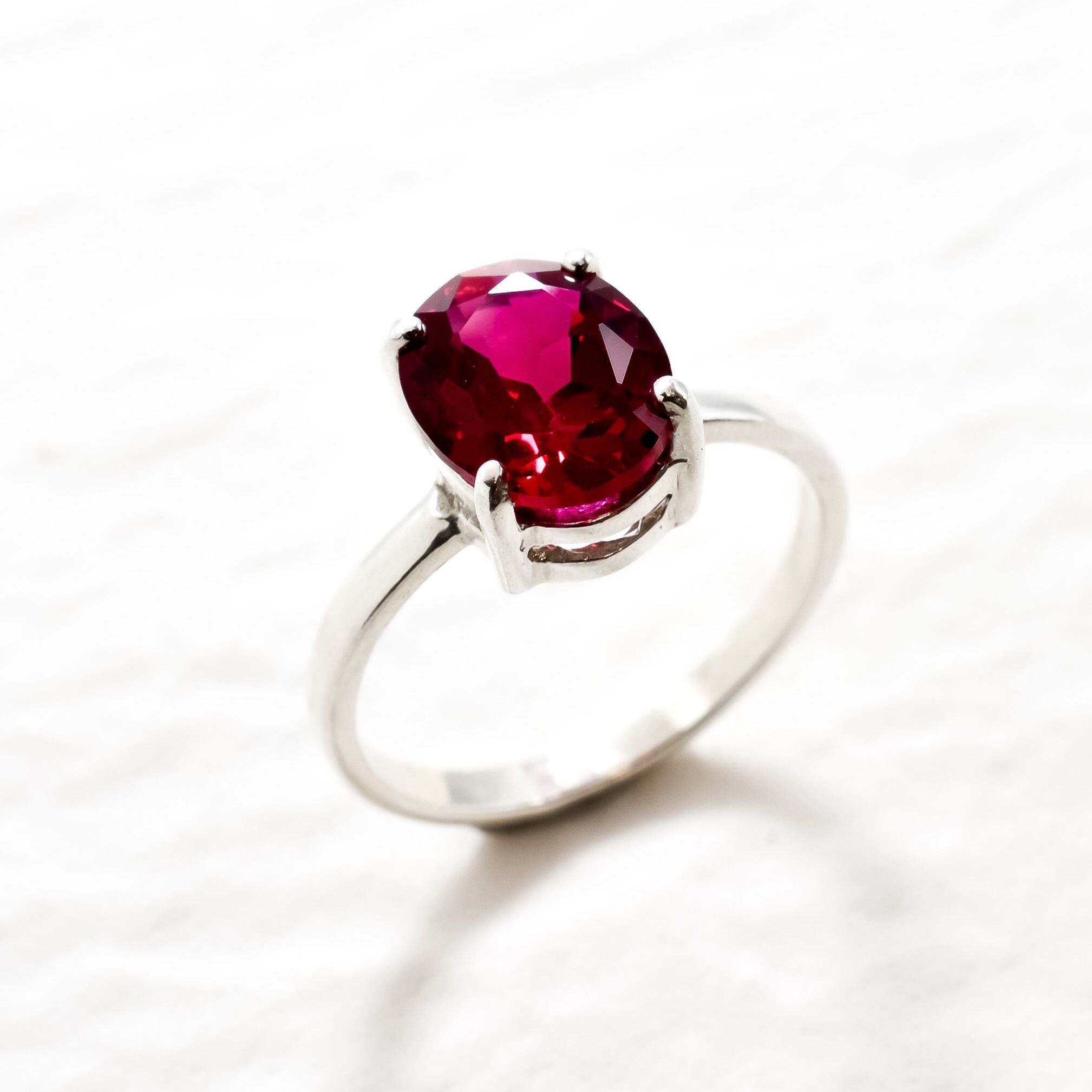 Created Ruby Ring made in 925 Sterling Silver with Oval Created Red Ruby in Prong setting, July Birthstone gift idea, symbolizes nobility, purity, and passion, ideal for everyday wear and perfect for birthday gifting and special occasions.