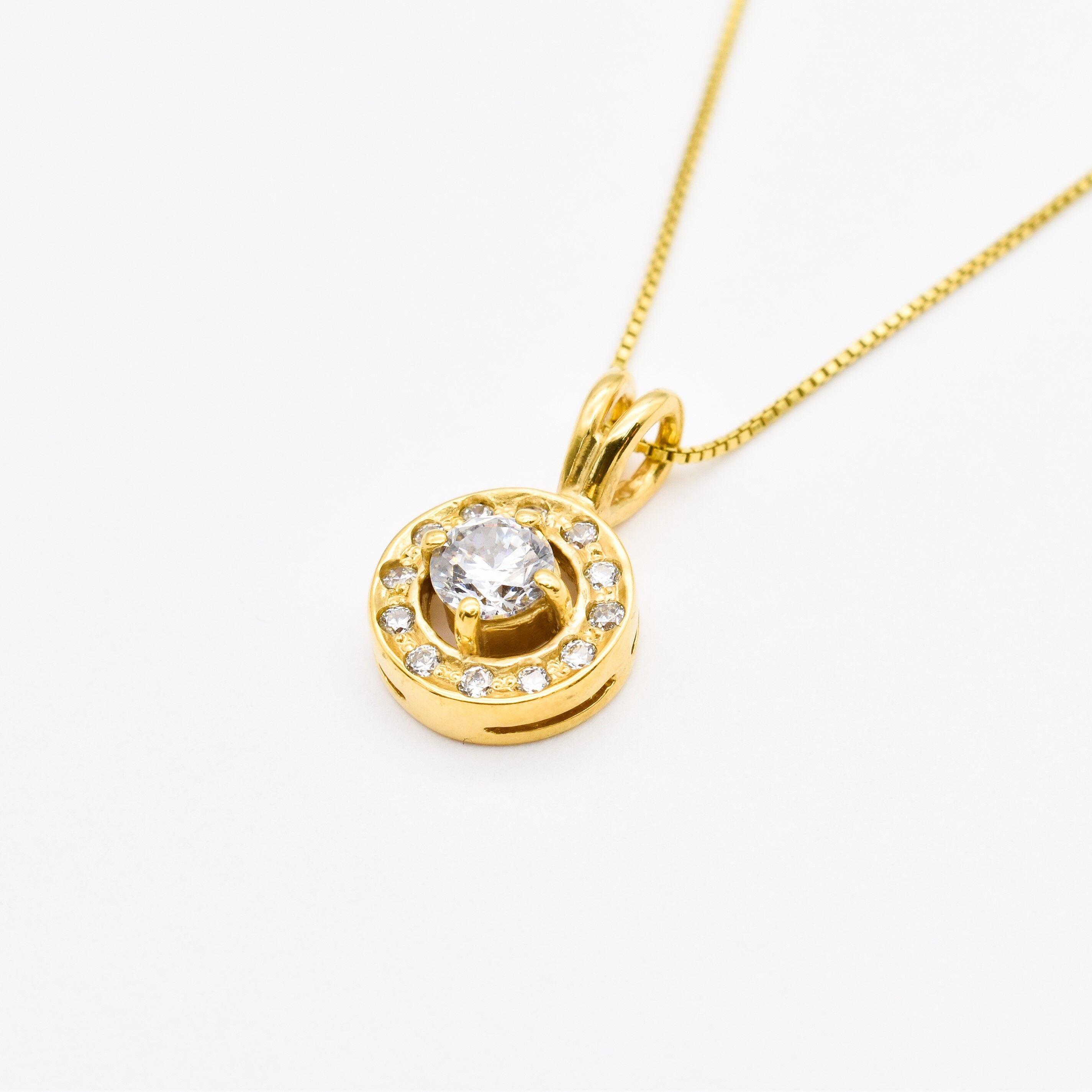 18k Yellow gold plated necklace with Diamond April birthstone in diamond cut and prong setting. Dainty diamond necklace ideal for special occasions and anniversary present. Round Diamond Necklace for eternal love, purity, and inner strength.
