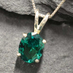 Charming 925 Sterling Silver Pendant with a vibrant Oval Created Green Emerald, a thoughtful gift for any occasion.