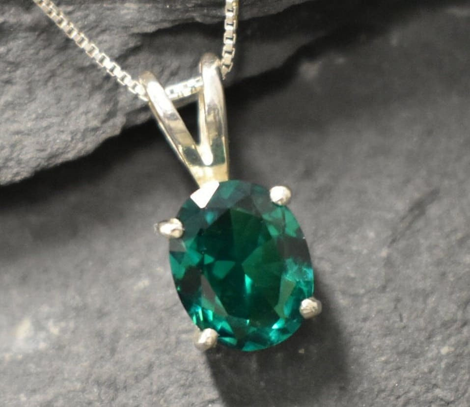 Stunning 925 Sterling Silver Pendant featuring an Oval Created Green Emerald, ideal for daily wear and meaningful gifts.