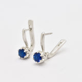 Elegant 925 Sterling Silver Earrings with a radiant Round Created Blue Sapphire, ideal for daily wear and September birthdays.