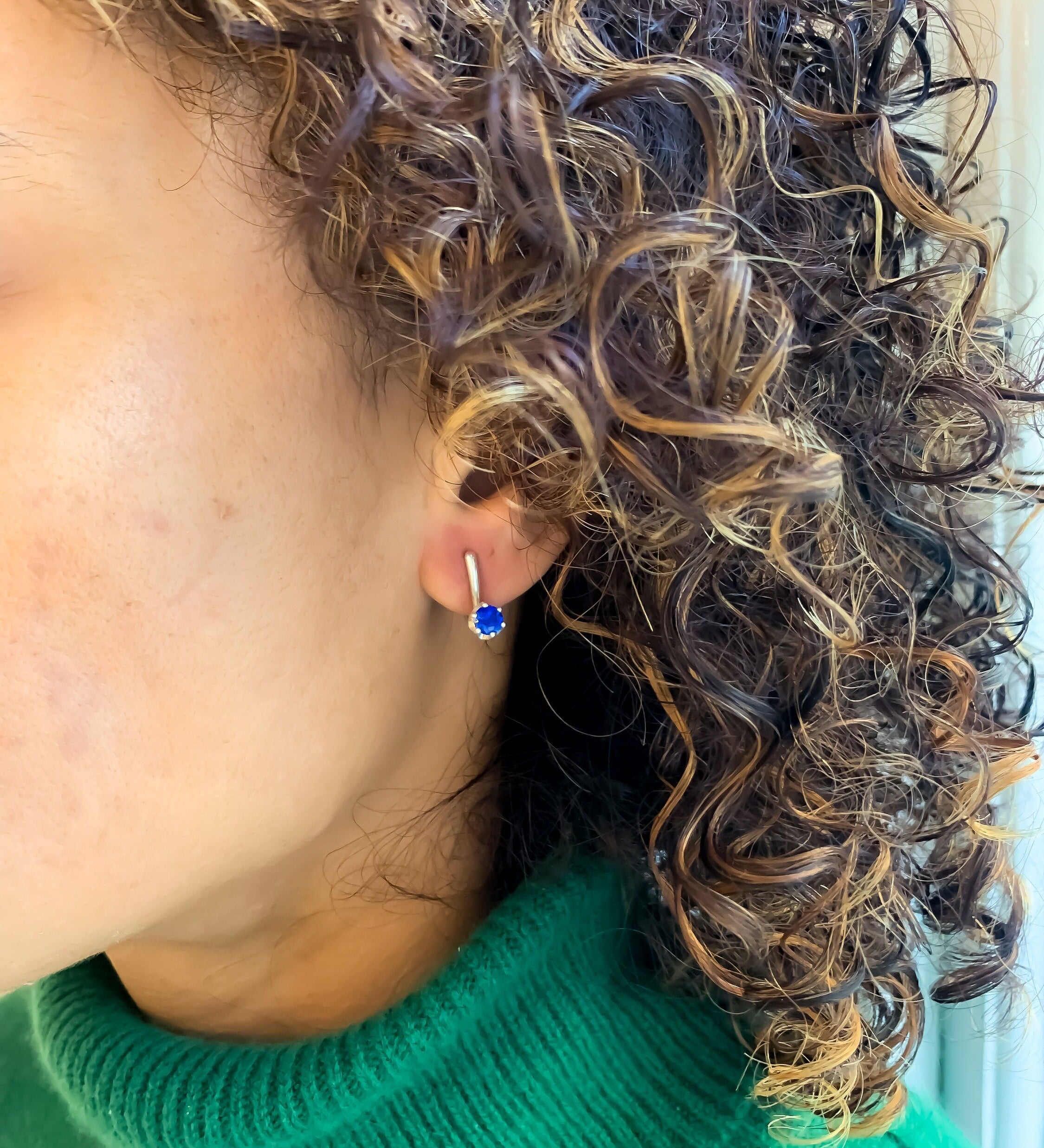 Stylish 925 Sterling Silver Sapphire Earrings featuring a stunning Round Created Blue Sapphire, perfect for special occasions.