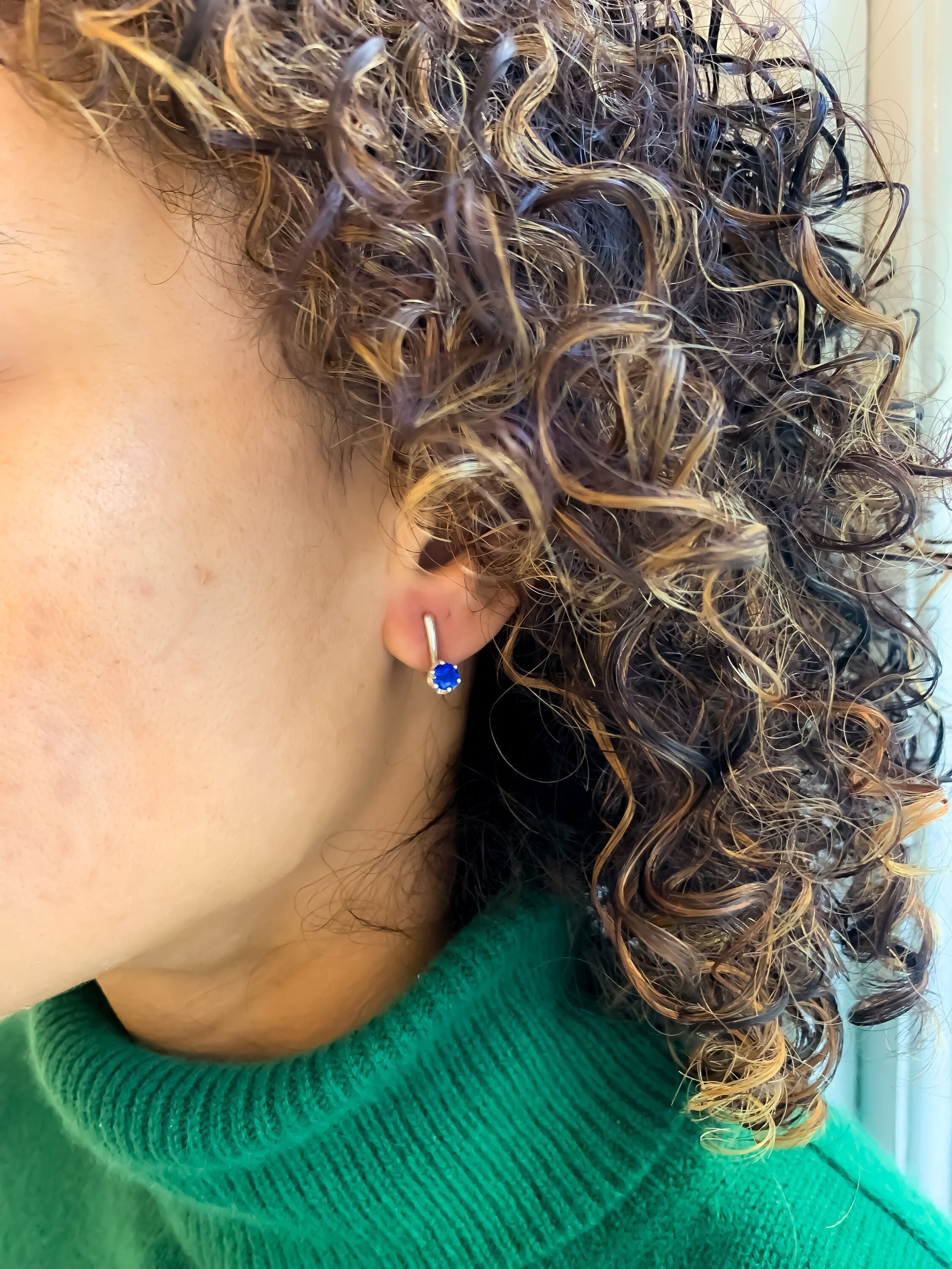 Stylish 925 Sterling Silver Sapphire Earrings featuring a stunning Round Created Blue Sapphire, perfect for special occasions.