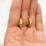 18k Yellow gold plated earrings with Diamond April birthstone in round cut and prong setting. Half hoop earrings resting in an open palm, ideal gift for her or anniversary present.