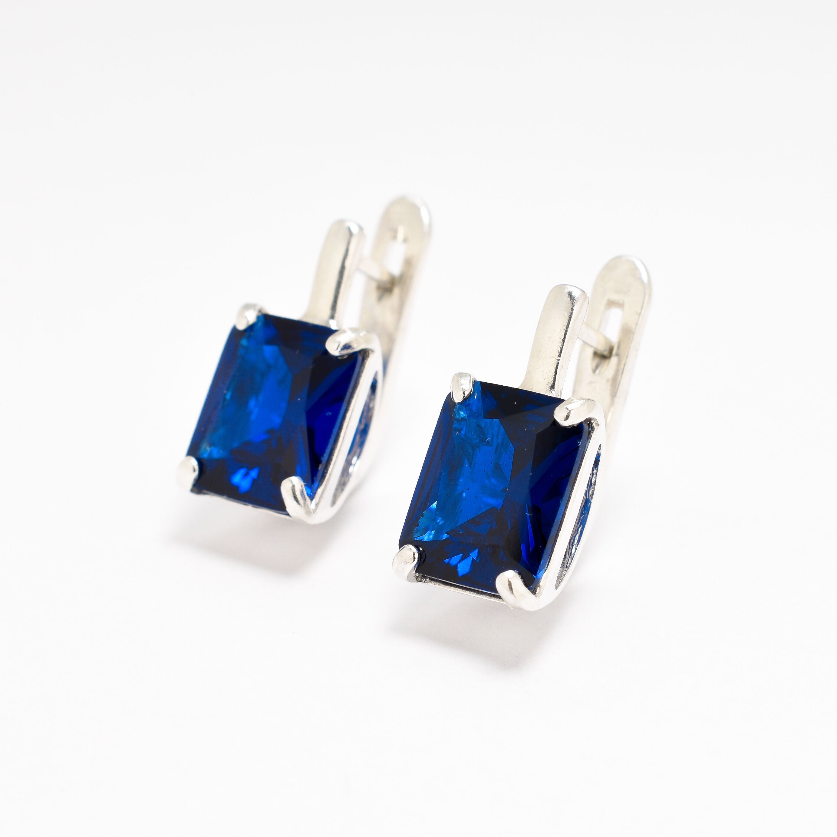 Created Sapphire Earrings made in 925 Sterling Silver with Baguette Created Blue Sapphire in Prong setting, September Birthstone gift idea, symbolizes sincerity, truth, and faithfulness, ideal for everyday wear and perfect for birthday gifting and special occasions.