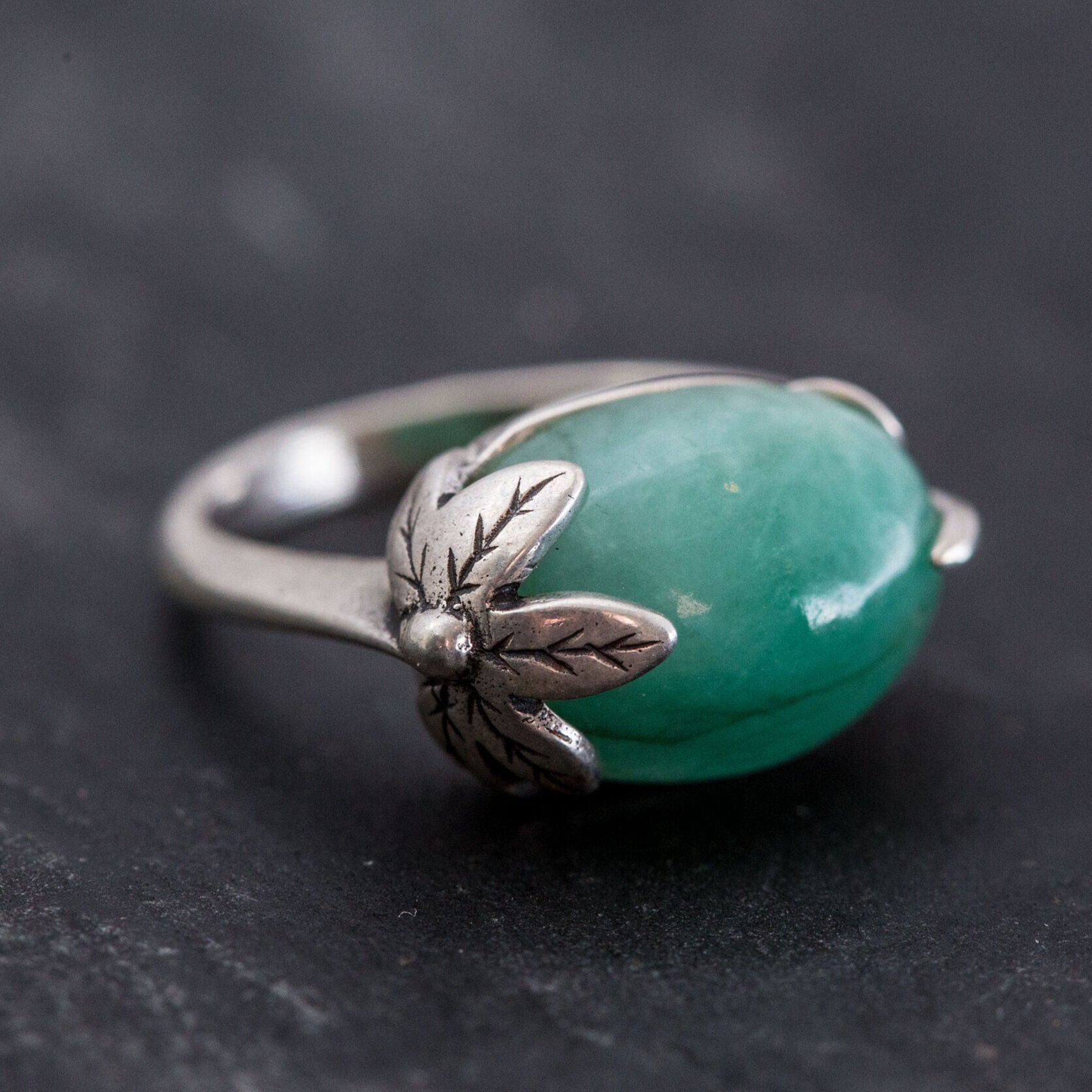 Chic 925 Sterling Silver ring showcasing a beautiful Oval Natural Emerald, a meaningful May birthstone for any occasion.