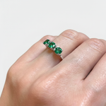 Elegant 925 Sterling Silver ring featuring a Round Created Green Emerald in a Three-Stone design—perfect for May birthdays.