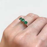 Elegant 925 Sterling Silver ring featuring a Round Created Green Emerald in a Three-Stone design—perfect for May birthdays.