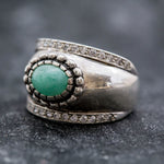 Beautiful 925 Sterling Silver ring with oval natural emerald, representing growth and harmony, ideal for special occasions.