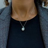 Elegant 925 Sterling Silver pendant featuring Oval Natural White Australian Opal, perfect for birthdays and special occasions.