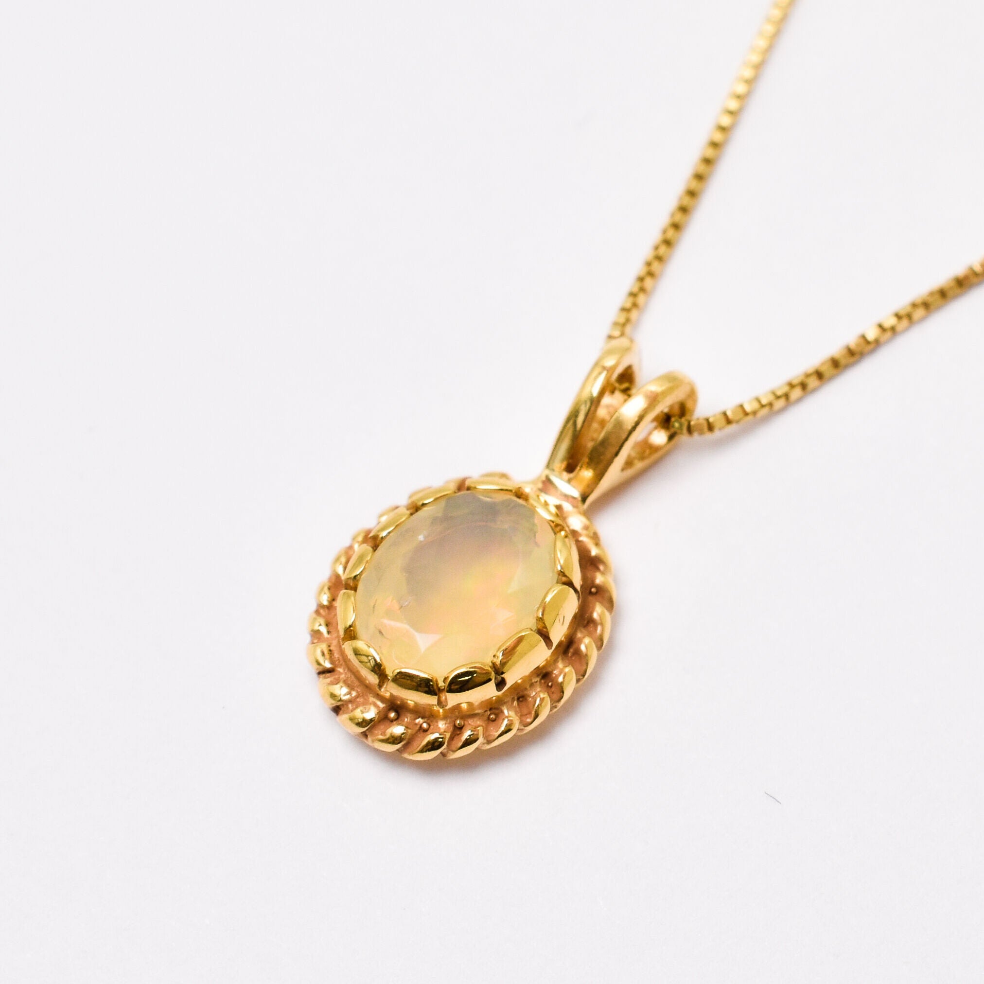 Natural Opal Necklace crafted in 18k yellow gold vermeil over solid 925 sterling silver, in oval cut, and prong setting. Vintage-inspired Opal Pendant ideal for special occasions, for layering necklaces or wearing solo. October birthstone stimulates imagination and love.