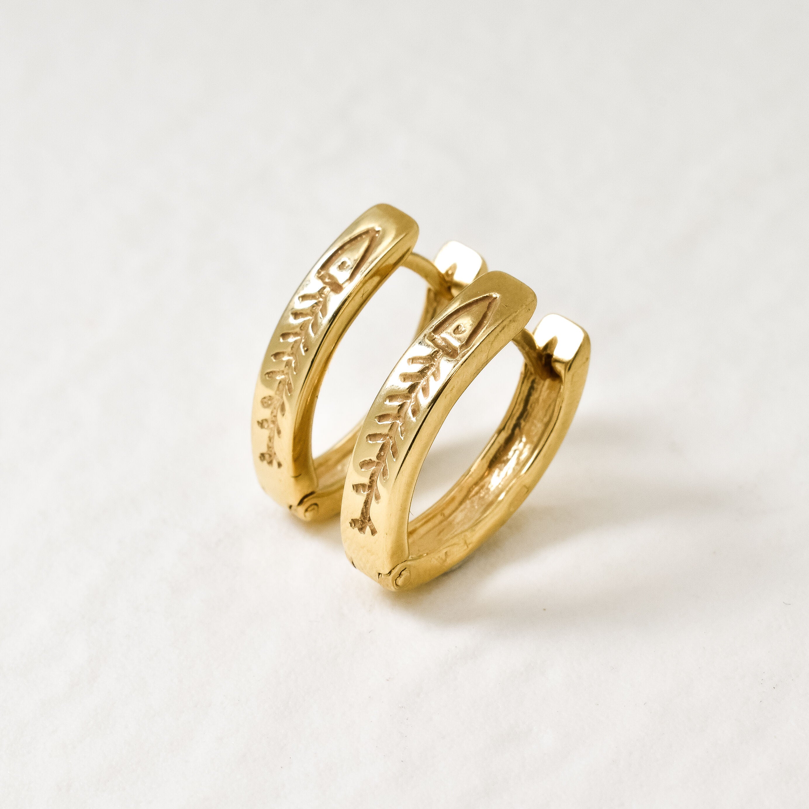 Fishbone Earrings set in 18k Yellow Gold over solid 925 sterling silver. Gold Hoop earrings for casual wear, and perfect gift idea for her. 