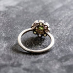 Floral cluster Peridot ring with vibrant Amethyst and Blue Topaz, a stylish piece for gemstone jewelry enthusiasts.