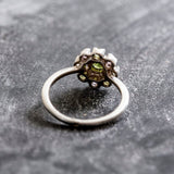 Floral cluster Peridot ring with vibrant Amethyst and Blue Topaz, a stylish piece for gemstone jewelry enthusiasts.