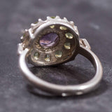 Floral-inspired design with Amethyst and Peridot gems, bringing joy and renewal to any day