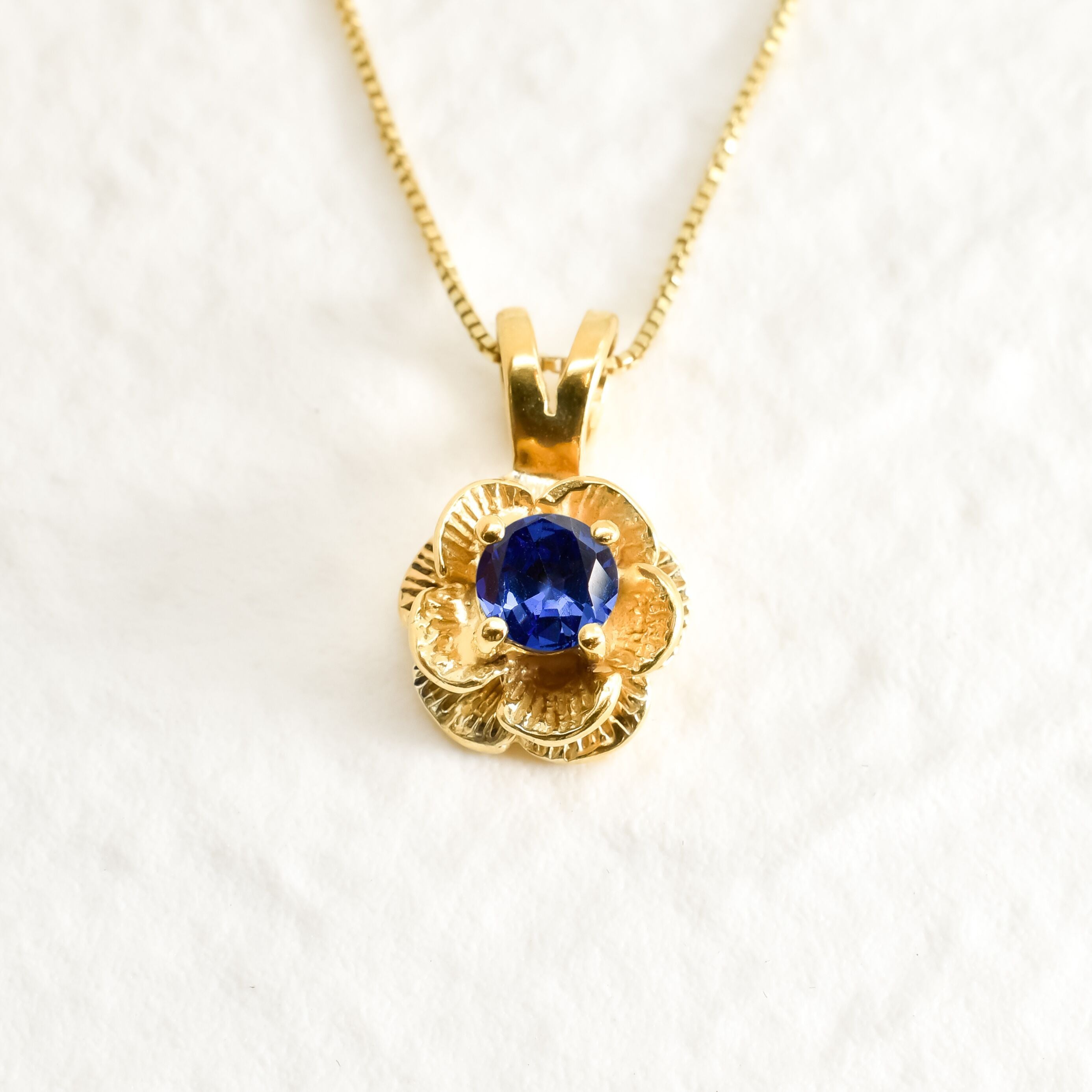 Blue Tanzanite Flower Necklace perfect gift idea for December birthdays.