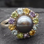 Black Pearl with gemstone halo, designed for jewelry lovers who adore vibrant gemstone combinations
