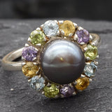 Black Pearl with gemstone halo, designed for jewelry lovers who adore vibrant gemstone combinations