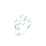 Blue gemstone ring designed for fashion-forward looks or December birthdays.