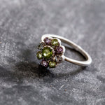 Genuine Peridot cluster ring with vibrant Amethyst and Blue Topaz accents set in sterling silver, ideal for birthdays and anniversaries.