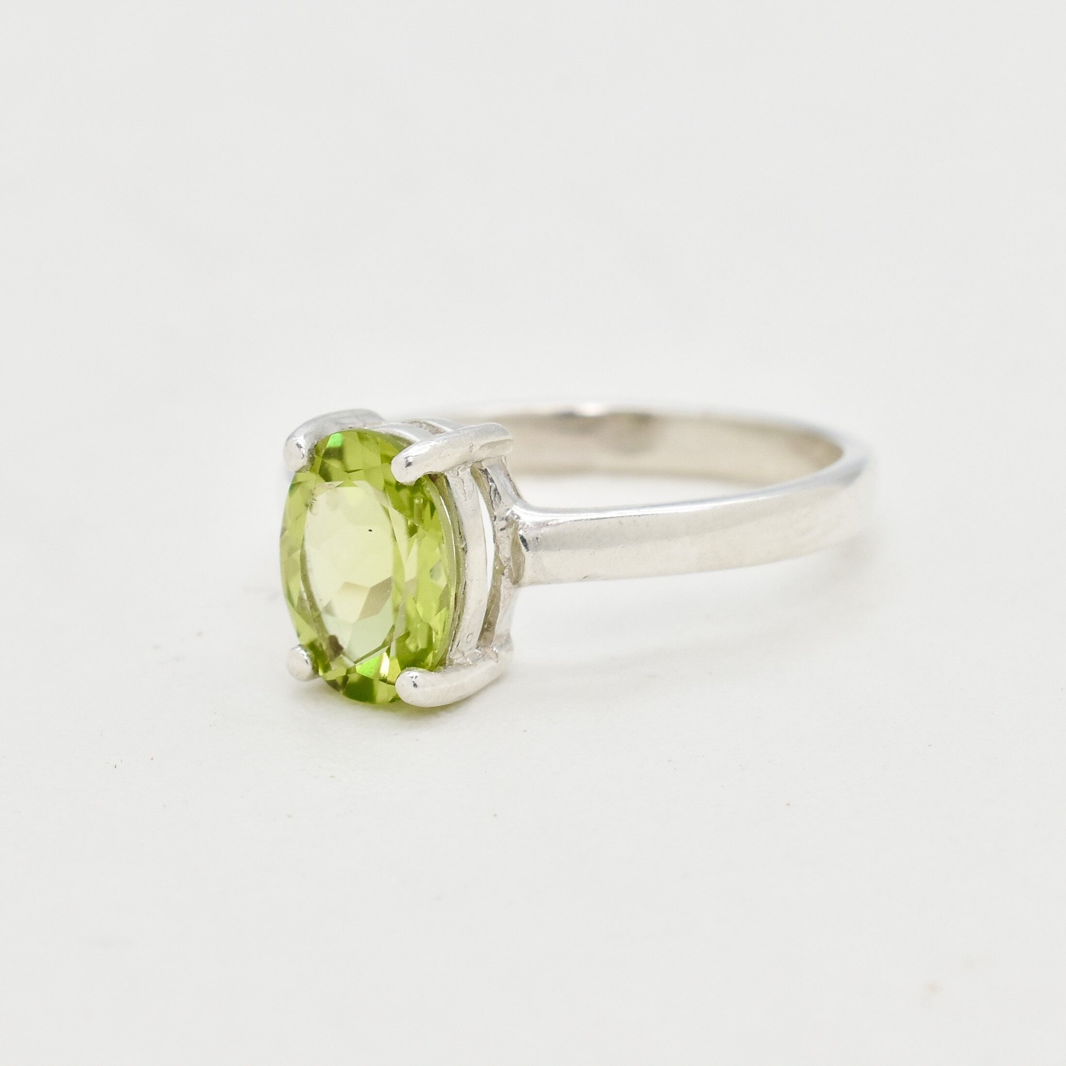Genuine Peridot ring in 925 sterling silver setting, bringing clarity and positivity, a meaningful August birthstone jewelry gift.