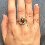 Elegant Ruby Halo Ring in 925 Sterling Silver, perfect for July birthdays and special occasions, symbolizing passion and purity.