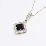 Modern Onyx Pendant Necklace ideal for cocktail parties.

