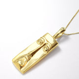 18k Yellow gold plated necklace with long face design. Artistic pendant ideal for maximalist style outfit, or as a personalized gift.