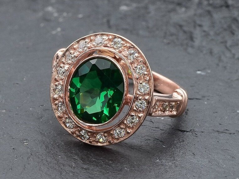 Rose Gold Vermeil Ring featuring a dazzling Oval Created Green Emerald, a timeless piece ideal for May birthdays and celebrations.