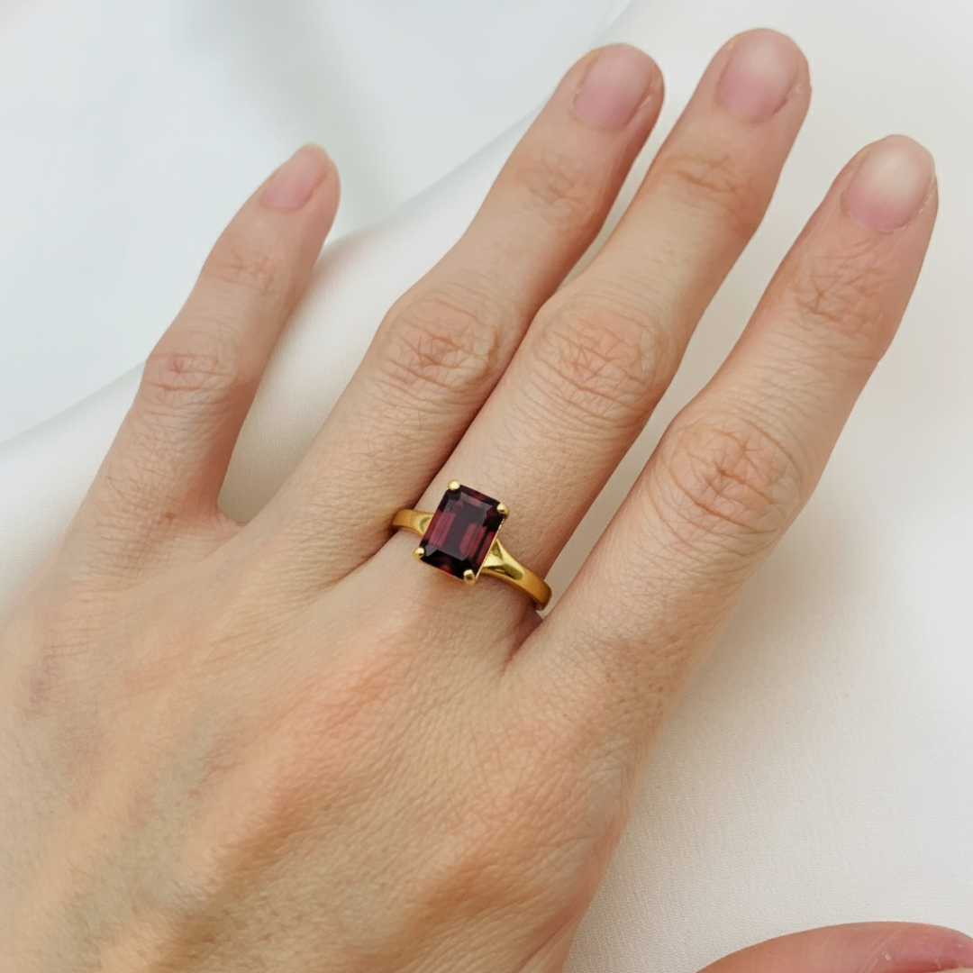 Elegant 18k Gold Vermeil Natural Garnet Ring in Solitaire setting, perfect for January birthdays and symbolizing love.