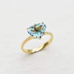 Heart Aquamarine March birthstone ring crafted in 18k Yellow Gold over Solid 925 Sterling Silver. Blue gemstone ring perfect as a valentine's gift idea, can be worn as an everyday ring that brings tranquility, aids in self-expression, and protects travelers. For courage, communication, soothing
