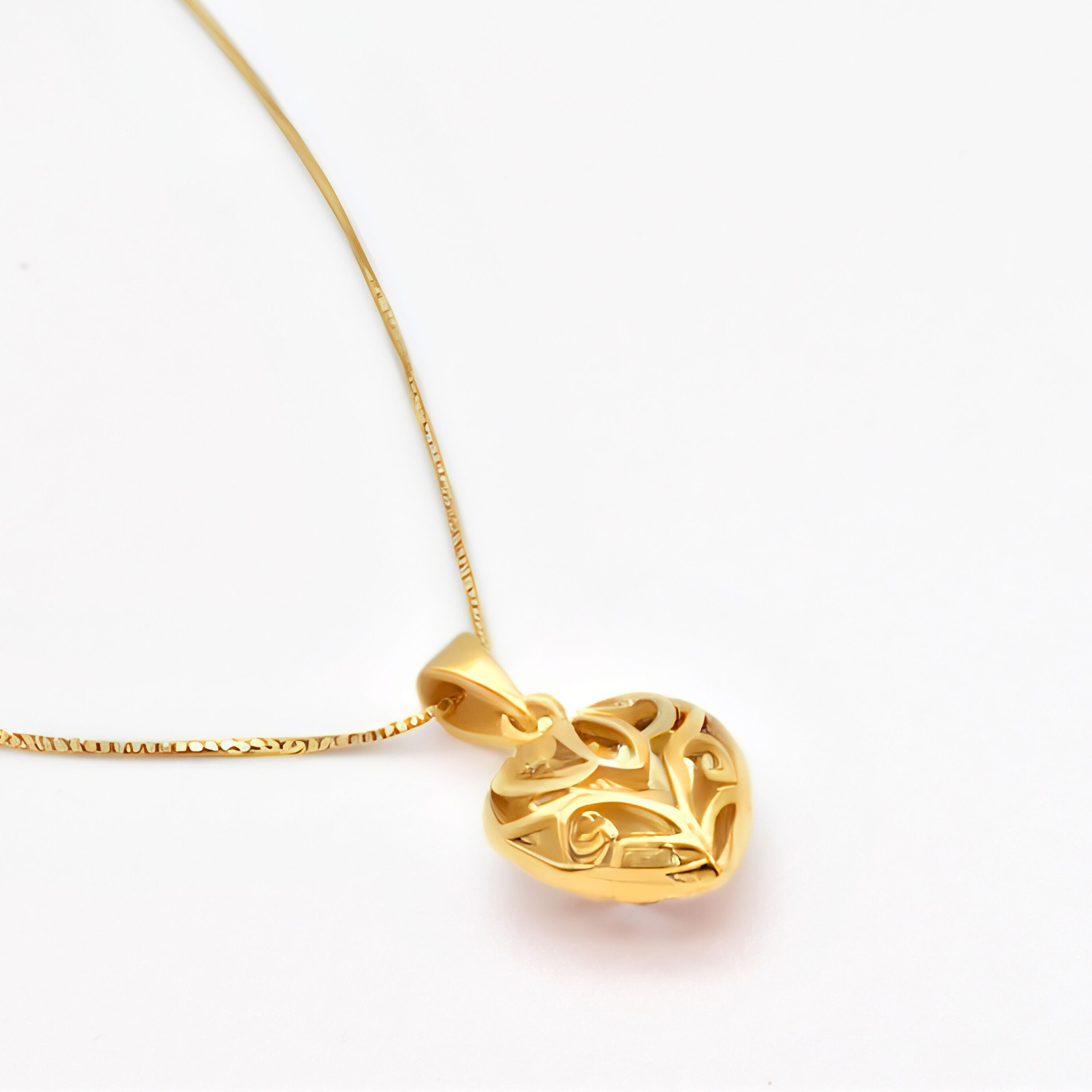 Heart Pendant crafted in 18k Yellow Gold Vermeil over solid 925 sterling silver, in a filigree pattern. Heart charm necklace perfect for everyday wear, ideal as valentine's day gift, or mother's day present. Gold puffed heart necklace.