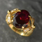 Elegant 18k Gold Vermeil Ruby Ring with a brilliant Oval Created Red Ruby, embodies passion and ideal for everyday elegance.
