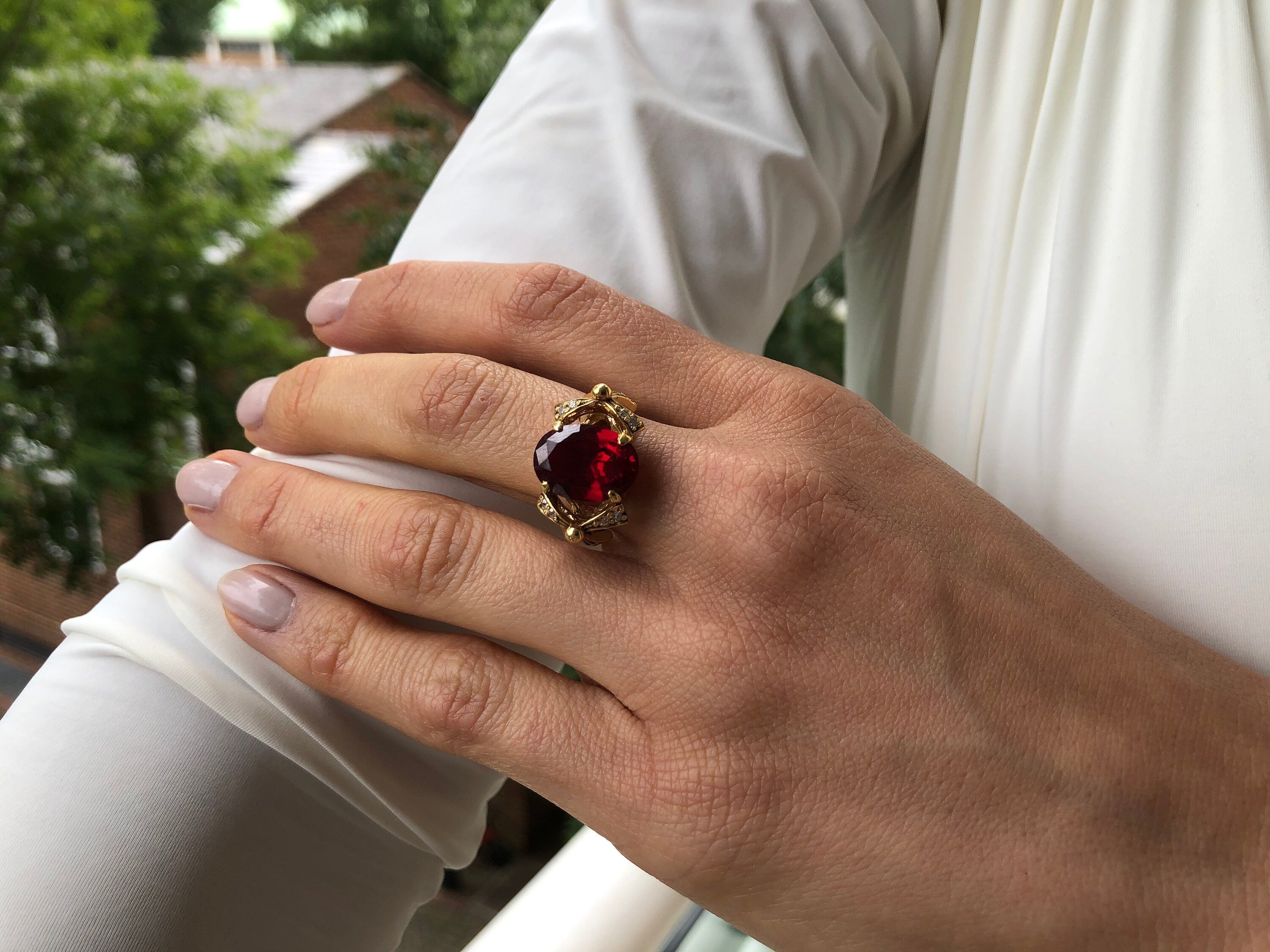 Ruby Solitaire Ring in 18k Gold Vermeil, featuring a stunning Oval Created Red Ruby, perfect for birthdays and special occasions.