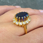 Elegant 18k Gold Vermeil Sapphire Ring featuring a Halo setting, perfect for September birthdays and special occasions.