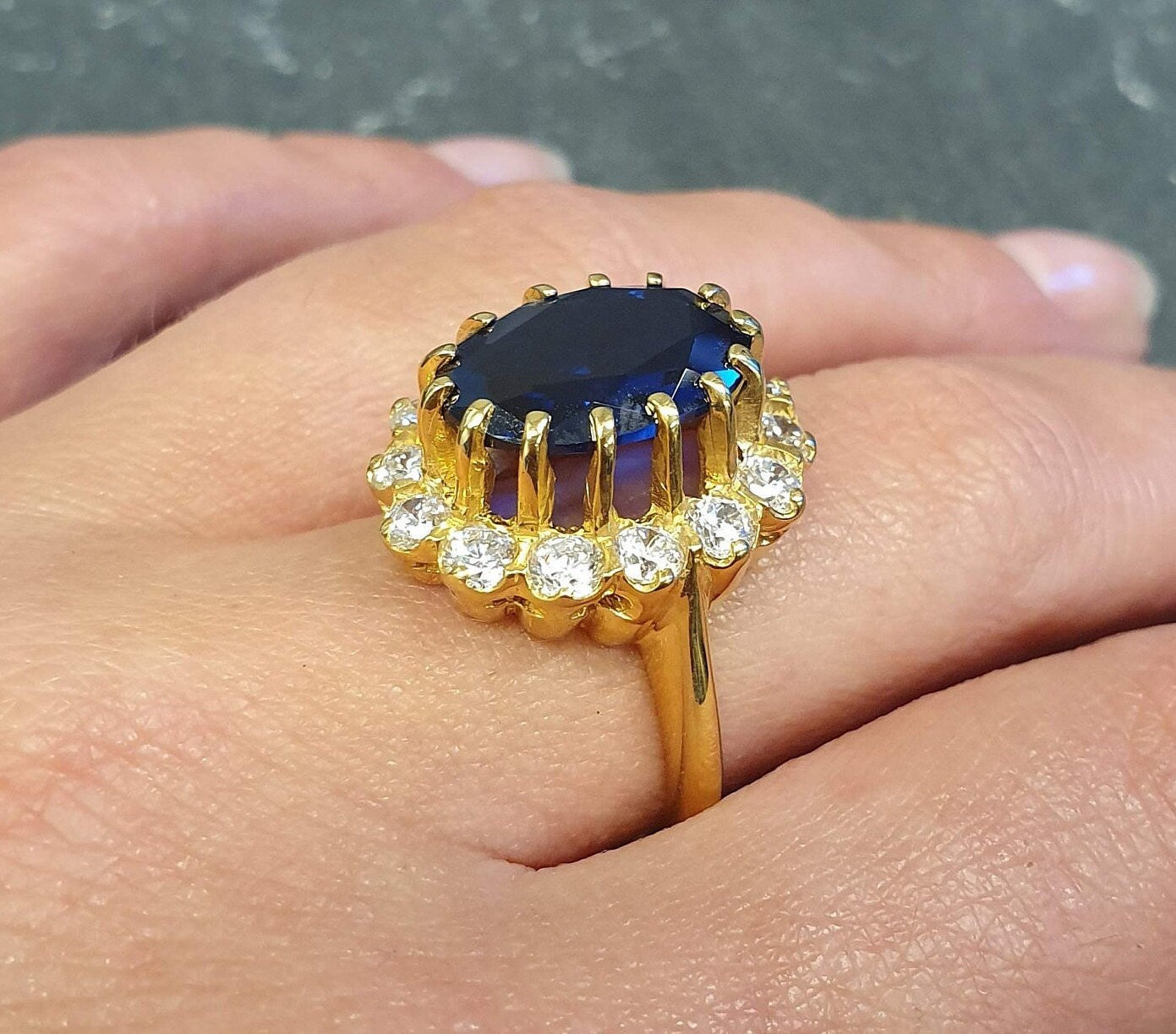 Elegant 18k Gold Vermeil Sapphire Ring featuring a Halo setting, perfect for September birthdays and special occasions.