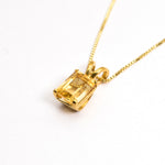 Yellow gold plated necklace with Natural Citrine November birthstone in emerald cut and prong setting. Solitaire Necklace ideal for birthday present, and special occasions. Citrine boosts positivity and prosperity. For joy, abundance, confidence