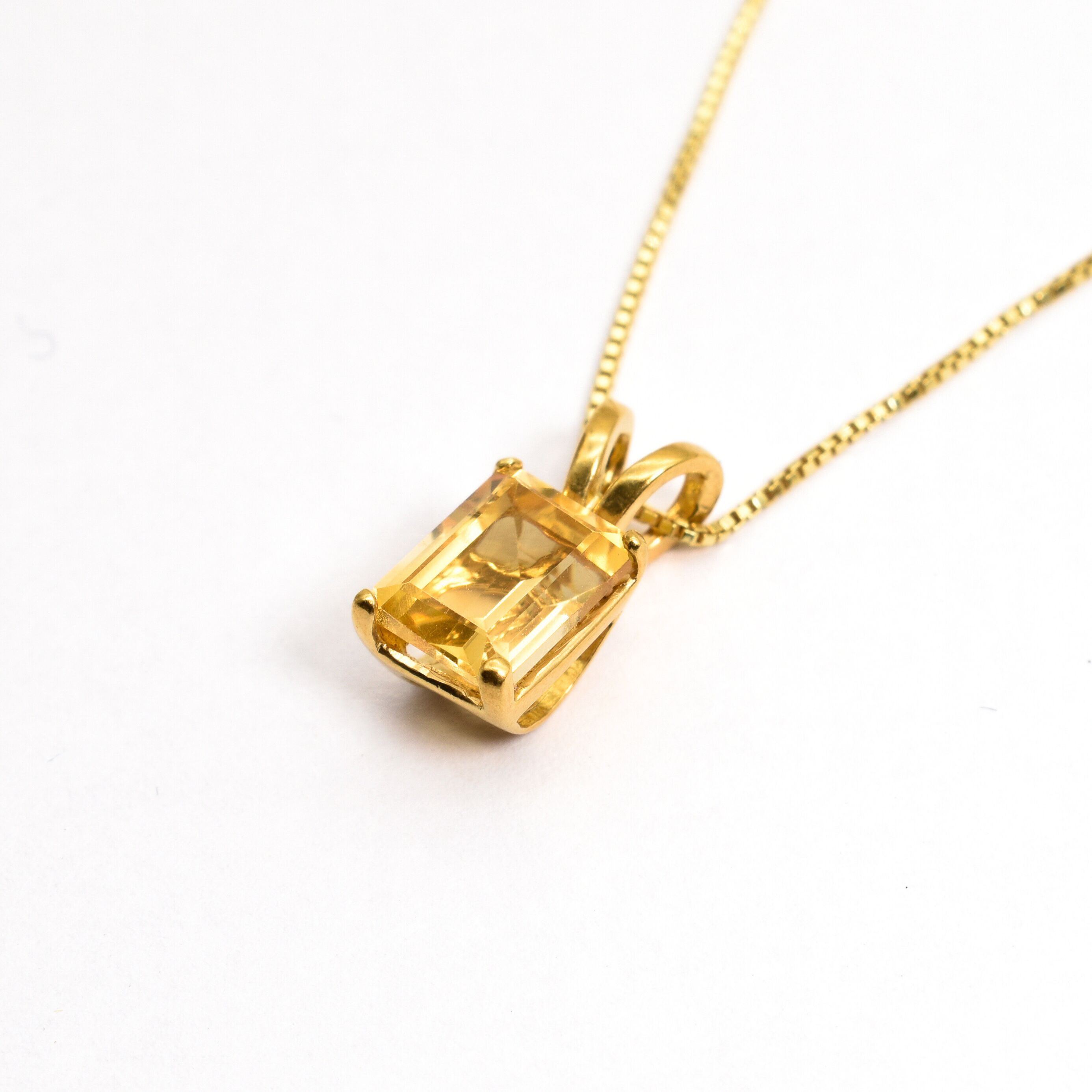 Yellow gold plated necklace with Natural Citrine November birthstone in emerald cut and prong setting. Solitaire Necklace ideal for birthday present, and special occasions. Citrine boosts positivity and prosperity. For joy, abundance, confidence