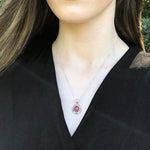 Sterling Silver Emerald Pendant featuring a vibrant Oval Created Green Emerald, perfect for birthdays and special occasions.