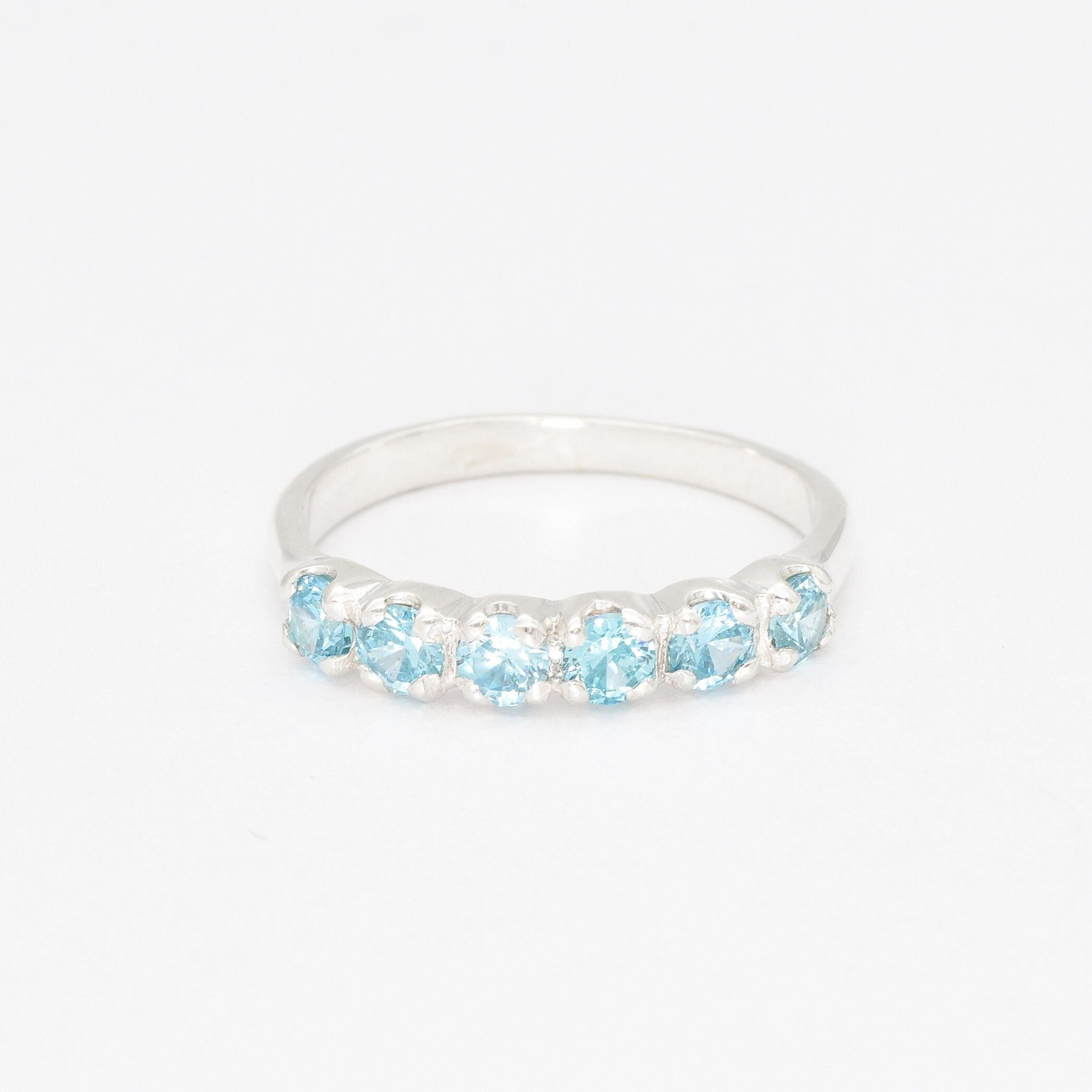Half Eternity Ring set with Blue Topaz Gemstones, in solid 925 Sterling Silver
