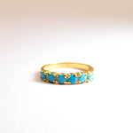 Turquoise Half Eternity Ring set in 18k Gold Vermeil over Solid 925 Sterling Silver, in a prong setting, and straight shank band. December birthstone ring that symbolizes protection and wisdom. Ideal for everyday ring stack or for wearing solo, and a perfect ring gift.