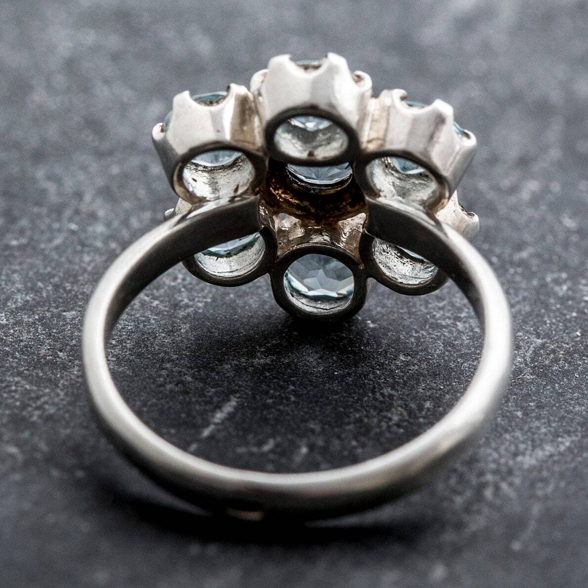 Handmade Blue Topaz cluster ring in floral shape, supports emotional balance, treasured gift for mom, great for special brunches