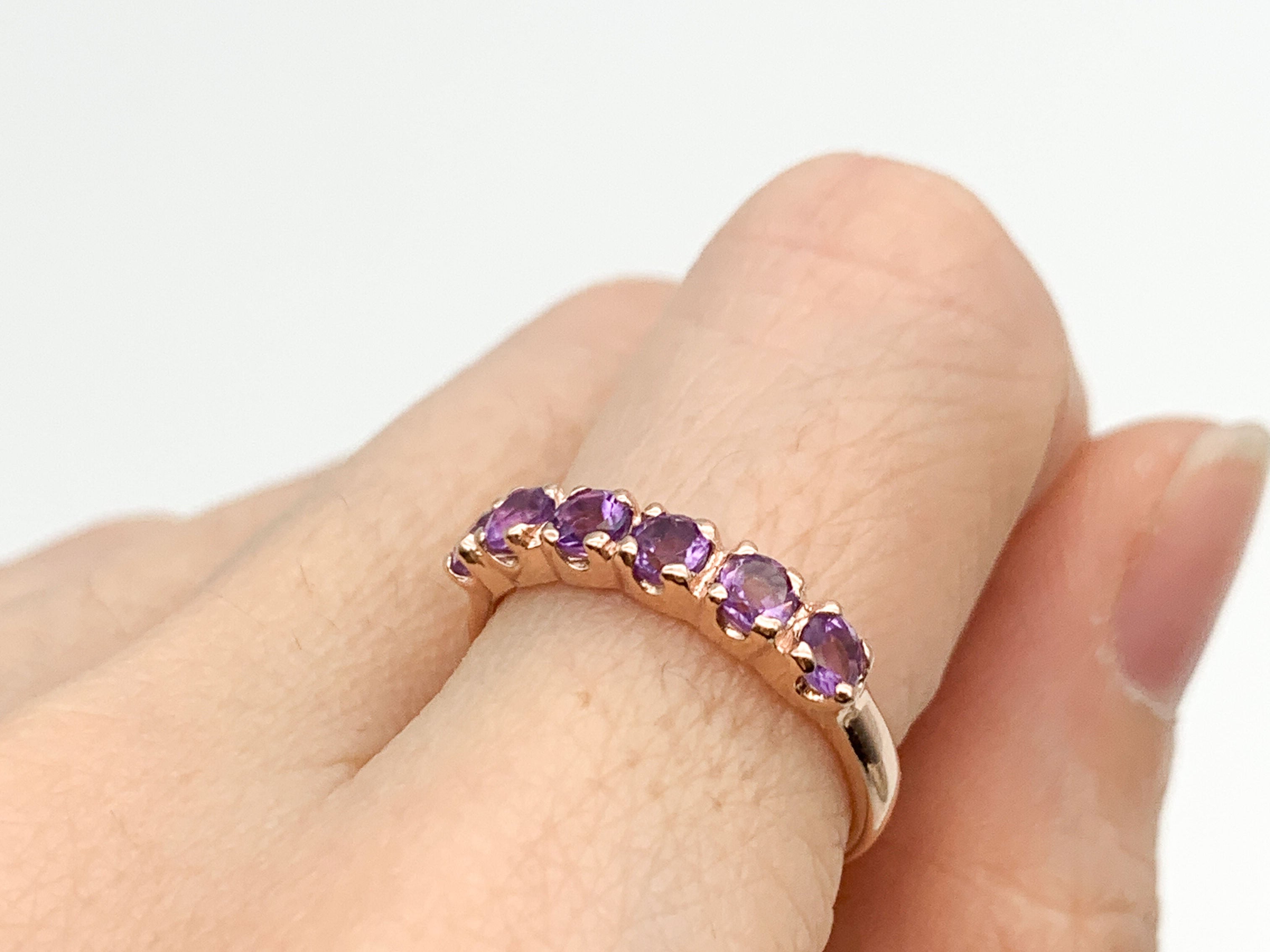 Amethyst Rose Gold Ring worn on index finger
