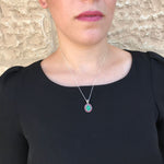 Natural Chrysoprase cabochon necklace framed with Ruby gemstones lends radiant color to understated tops, bringing style, emotional clarity, and meaningful gemstone gifting to birthdays or self-care.