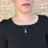 Natural Chrysoprase cabochon necklace framed with Ruby gemstones lends radiant color to understated tops, bringing style, emotional clarity, and meaningful gemstone gifting to birthdays or self-care.