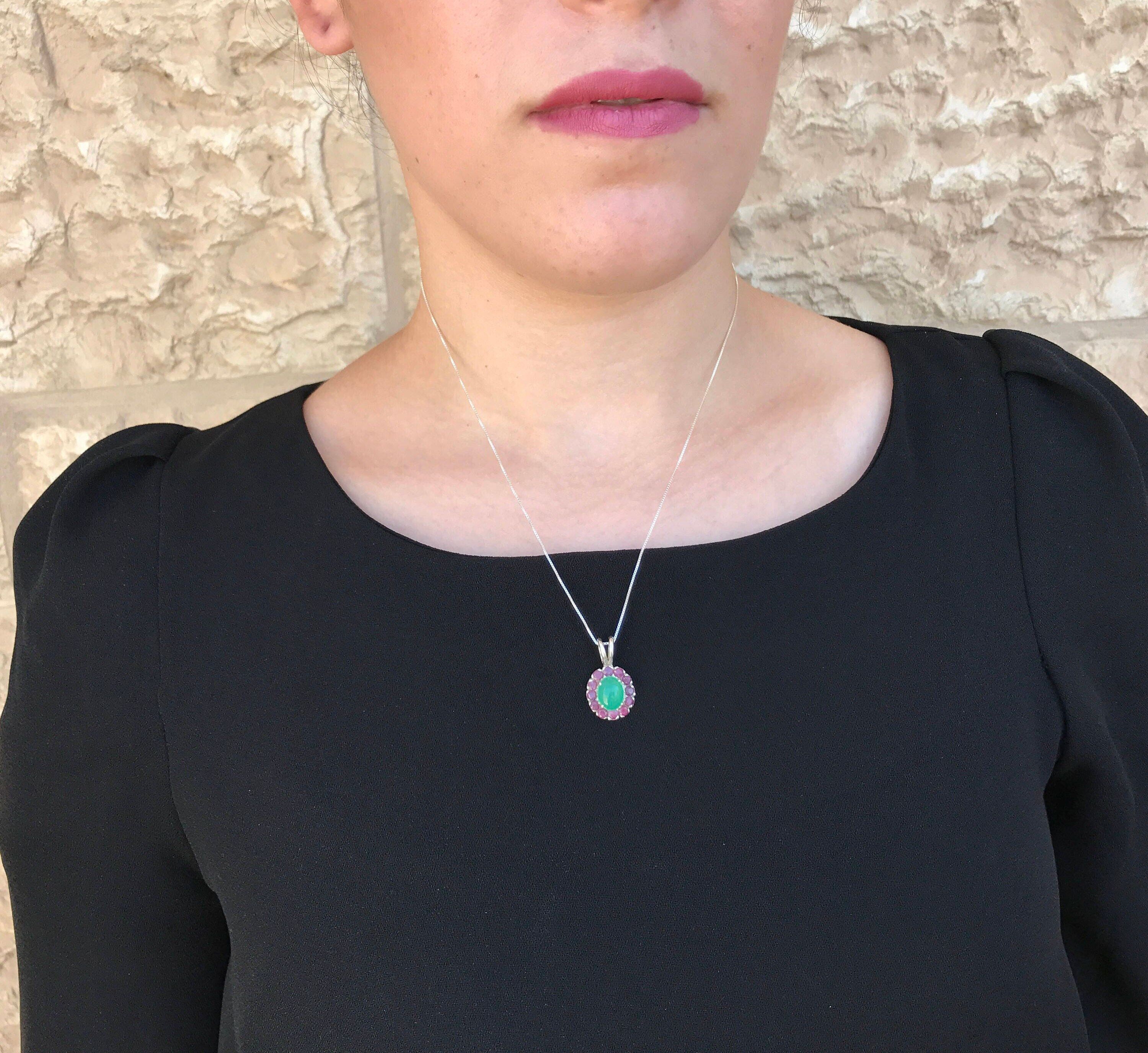 Natural Chrysoprase cabochon necklace framed with Ruby gemstones lends radiant color to understated tops, bringing style, emotional clarity, and meaningful gemstone gifting to birthdays or self-care.