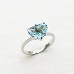 Heart aquamarine march birthstone ring in a prong setting, and stunning blue clarity
