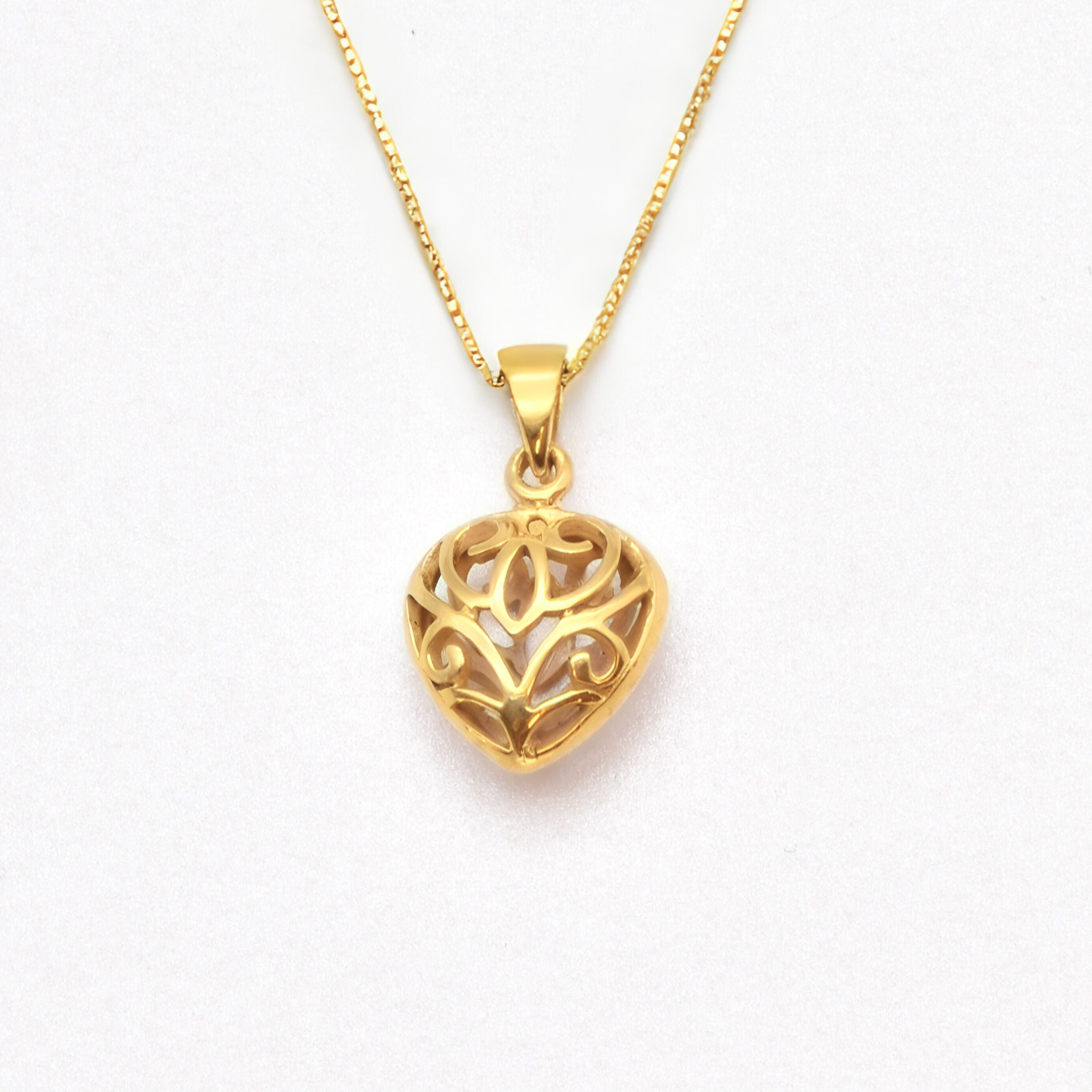 Heart Pendant crafted in 18k Yellow Gold Vermeil over solid 925 sterling silver, in a filigree pattern. Heart charm necklace perfect for everyday wear, ideal as valentine's day gift, or mother's day present. Gold puffed heart necklace.