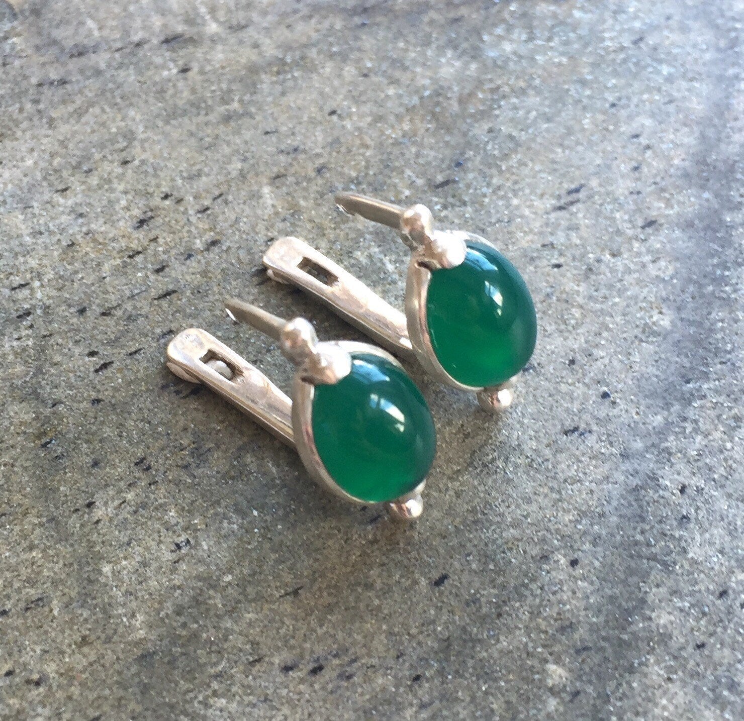 Chic 925 Sterling Silver earrings with an oval Created Green Emerald, perfect for May birthdays and everyday elegance.